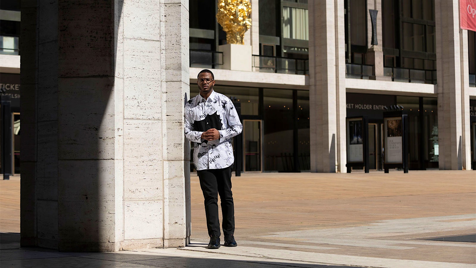 Portrait of Kwame Onwauchi outside in front of David Geffen Hall.